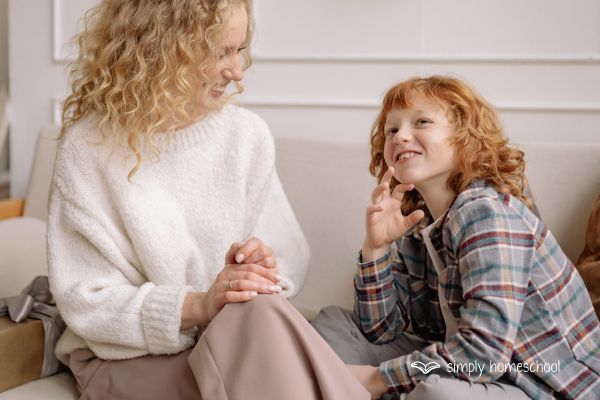 Mother and child talking: Advice for simplifying homeschool from Simply Homeschool